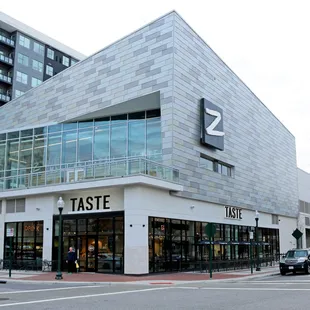 the outside of a building with a glass facade