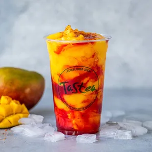 Chamango: Mango slushy with real mango chunks, adorned with chamoy and a sprinkle of tajin