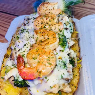 I have a pineapple stuffed with yellow rice with chicken,Broccoli and cheese topped off with my favorite&quot;shrimp&quot;It was delicious