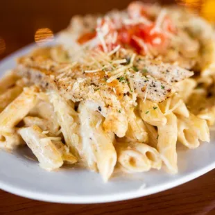a plate of pasta on a table