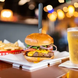 a burger and a glass of beer