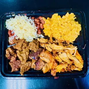 entree- Jerk Chicken, cajun steak,  Mac-n-Cheese, Red Beans and Rice