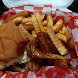 Tastebudz, bbq chicken sandwich, fries, and 2 wings..more than I asked for....so good!