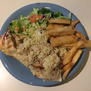 Quesadilla, rice, house salad and yuca. Really tasty! Add some sour cream and sea salt for the yuca and sigh with contentment.