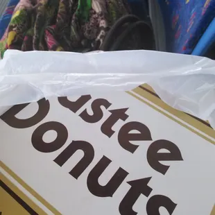 Two glazed, two  buttermilk drops to adjust my sugar fix for the weekend. Also a ice cold chocolate milk to wash them down.