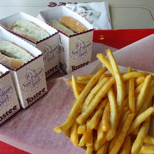 Four cheeseburgers,  no mustard,  crispy fries.....