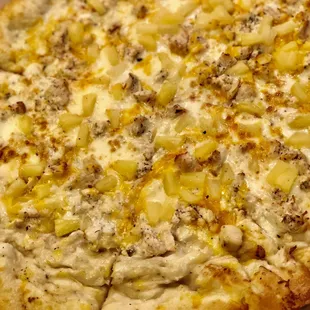 Chicken Alfredo pizza with pineapple, definitely more underwhelming than it seems.