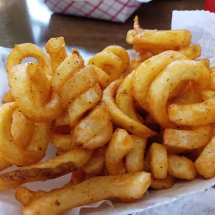 Seasoned curly fries. Not as heavily seasoned as Arby's, but similar. And yummy.