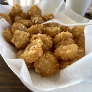 a basket of fried chicken nuggies