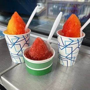 three cups of watermelon ice cream