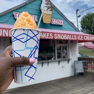 An Okd Fashioned Egg Custard Snowball and the storefront