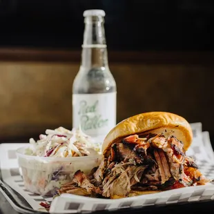 pulled pork sandwich and coleslaw