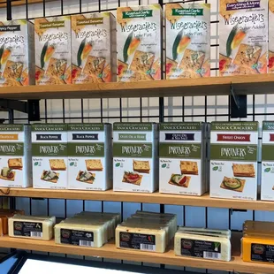 a variety of cheeses on display