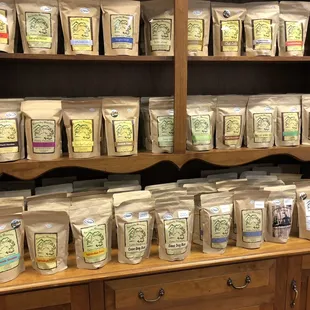 a shelf full of teas