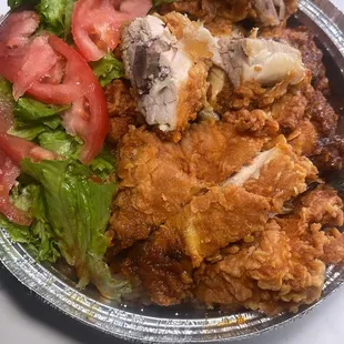 Fried Chicken with rice and peas /fresh lettuce and tomatoes