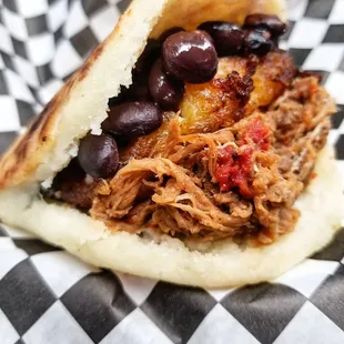 Pabellon Arepa. Black beans, sweet plantains, shredded beef and cheese. Yummy!