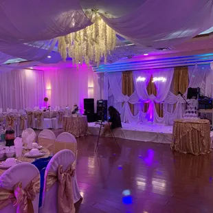 a banquet hall decorated for a wedding