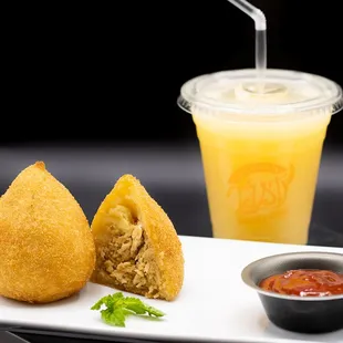 a fried egg roll and a drink