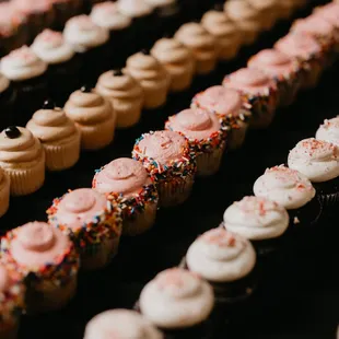 a variety of cupcakes on display