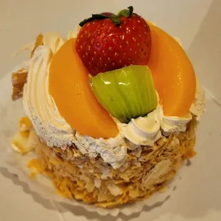 a cake with fruit on top