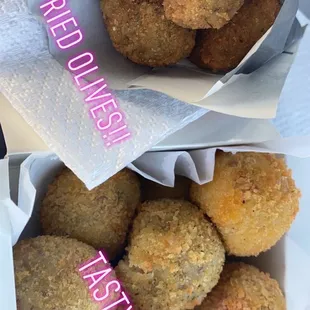 a bag of fried donuts