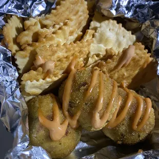 The cheese balls are filled with an addictive cream cheesy center. We loved eating them with the crisp crackers!