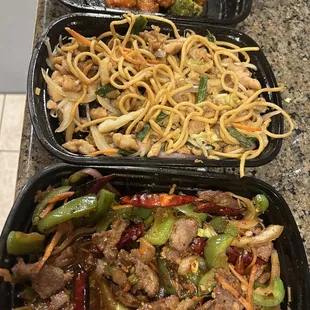 Kids got to orange chicken before the photo op.   Orange chicken, chow mein, Mongolian beef