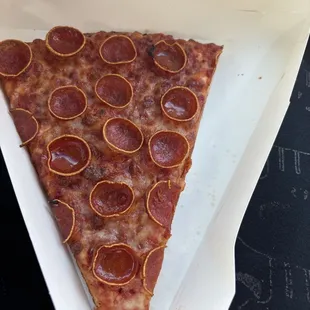 Non-fresh pizza and burnt reheated