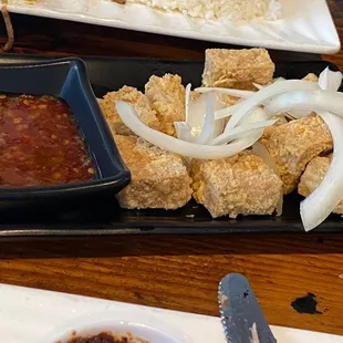 A9. Salt and Pepper Tofu (with RAW onions??)