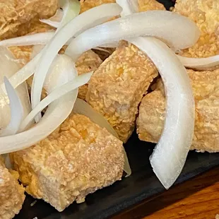 A9. Salt and Pepper Tofu (with RAW onions??)