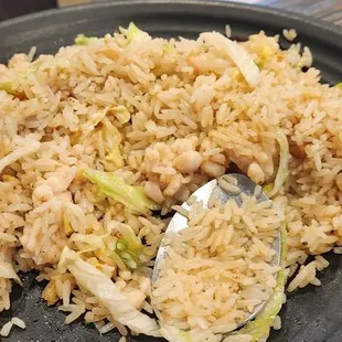 Half eaten since we were so hungry. Salty fish Fried rice. Soo good.