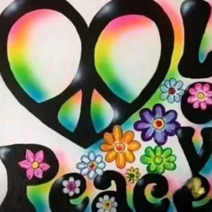 a peace sign with flowers