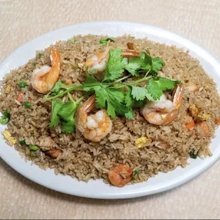 a plate of shrimp and rice