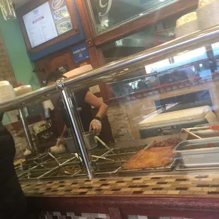 They serve large portions which keeps the food fresh because I see them rotating out the pans very often.