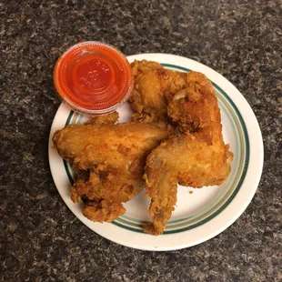 a plate of fried chicken
