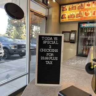 a sign in front of a restaurant