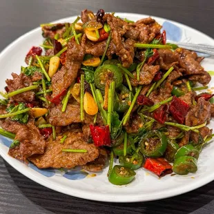Chili sautéed beef with cilantro.