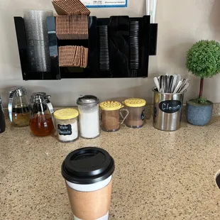 a cup of coffee on a counter