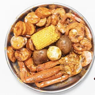 a plate of seafood and potatoes