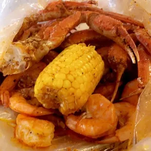 a crab and corn on the cob