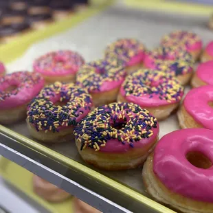 a variety of frosted donuts