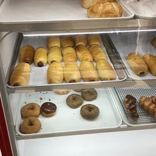 a display case full of doughnuts