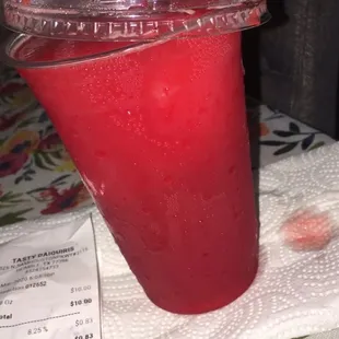 a drink in a plastic cup