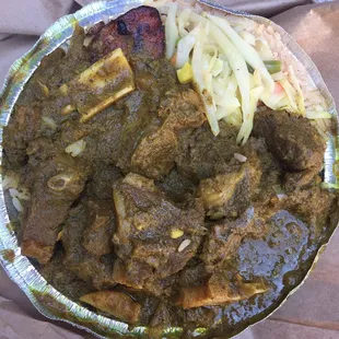Best curry goat! Generous medium plate $10