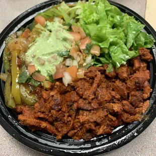Al Pastor bowl with a rice and pinto beans base. Delicious!