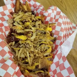 Bbq pork, cheese, fries and fried o ions.