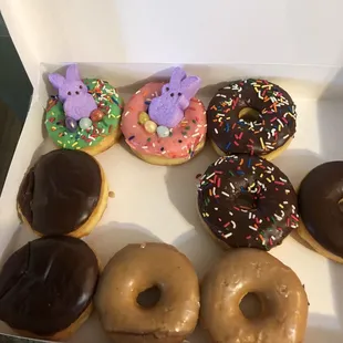 a variety of donuts in a box