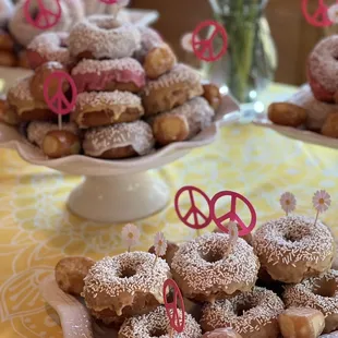 a variety of doughnuts on a table