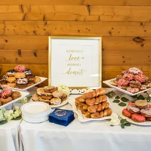 All you need is love and a TASTY donut!! Our wedding dessert table was a huge hit because of these little gems!