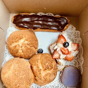 Left to right: Cream Puffs, Eclair, Mini Pastry, and Birthday Macaroon!